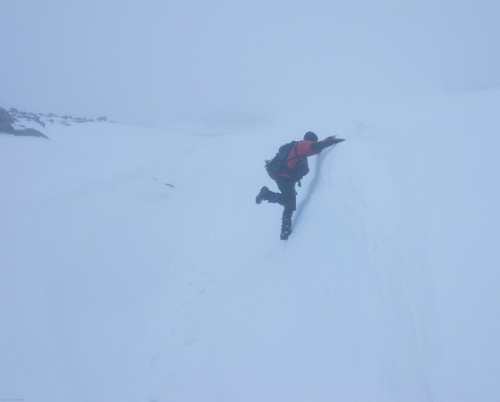 Callum playing on a steep snow feature