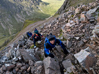 Mary leads the Pringles out of the col towards the summit of Stob Coire nam Beith