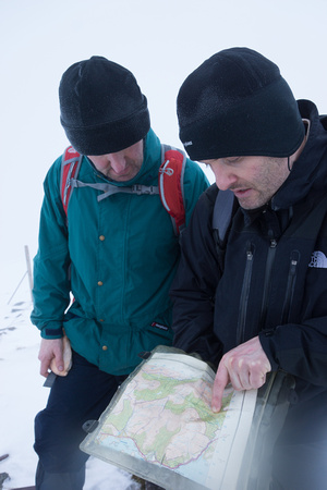 Checking the map on the summit