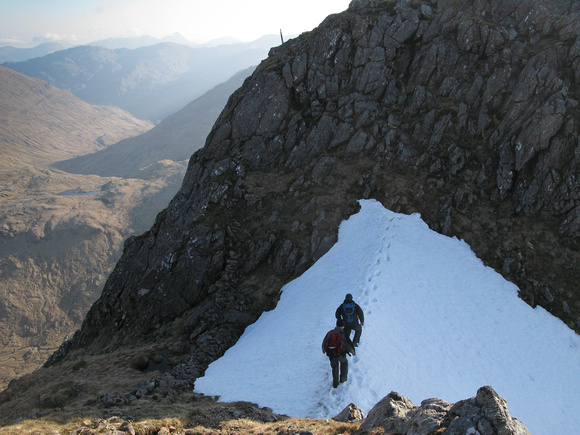 Crossing a snow patch on Creag nam Damh