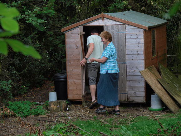 Mum and Peter about to fix the hens