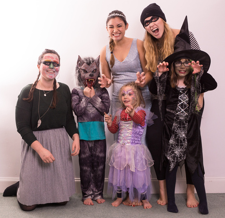 Jess, Jessica P and Katie help the wee ones warm up for Halloween.