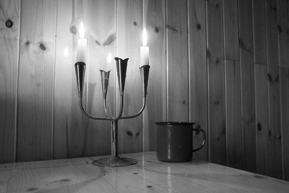 A mug and candelabra