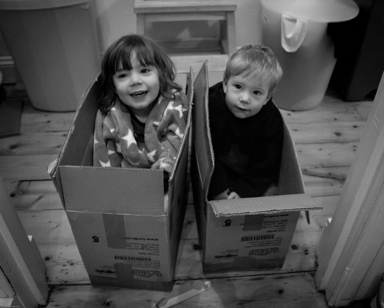 Playing in the boxes the suitcases came in