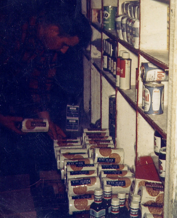 Dad stocking up the shop